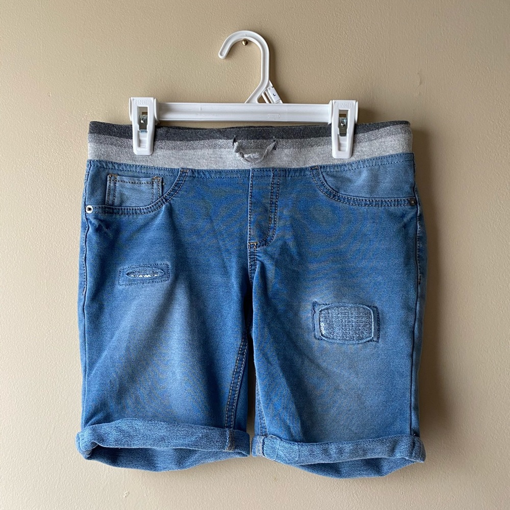 Shorts with distressed sequins